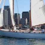 Sail Boston aboard they Sailboat Schooner Adirondack III With the Boston Skyline in the background