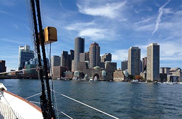 The Boston Skyline from the perspective of the Schooner Adirondack III deck in Boston Harbor