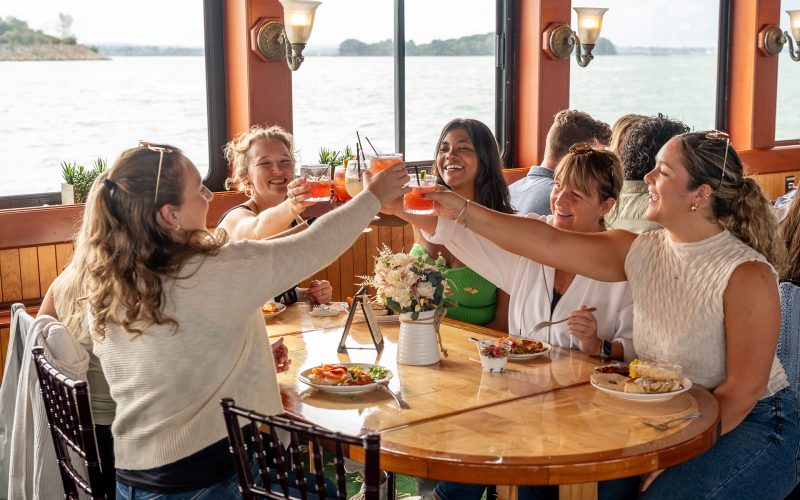 Group of women enjoying a brunch aboard the yacht Northern Lights in Boston Harbor