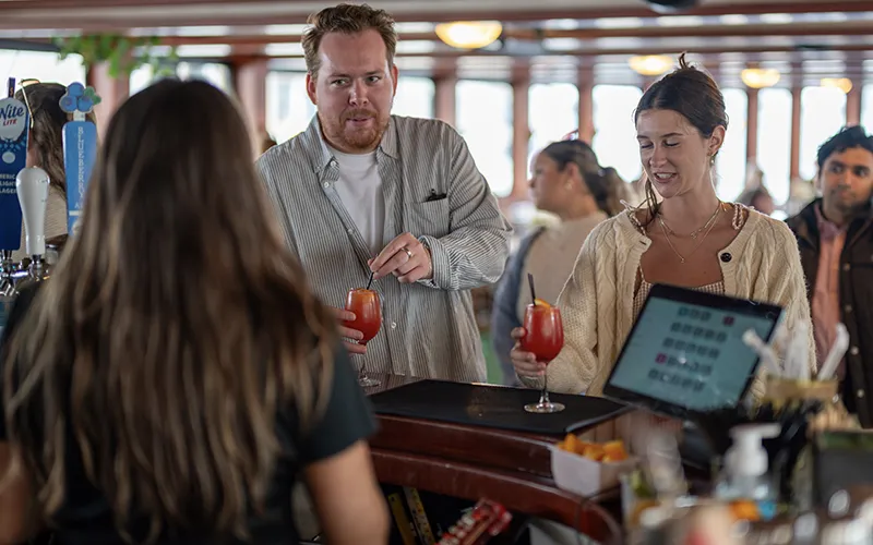 Guests enjoying a brunch on the yacht Northern Lights in Boston Harbor with Classic Harbor Line Boston