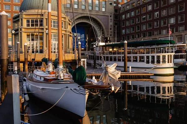 Boston_Location-Directions-Main the yacht Northern Lights and Schooner Adirondack docked at a pier in Boston