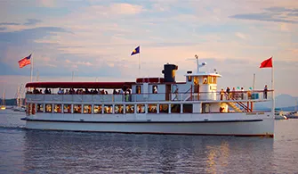 the yacht Northern Lights sailing down the river for a sunset cruise