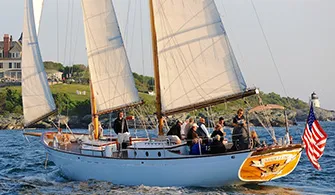 the Schooner Madeleine sailboat cruising down the river