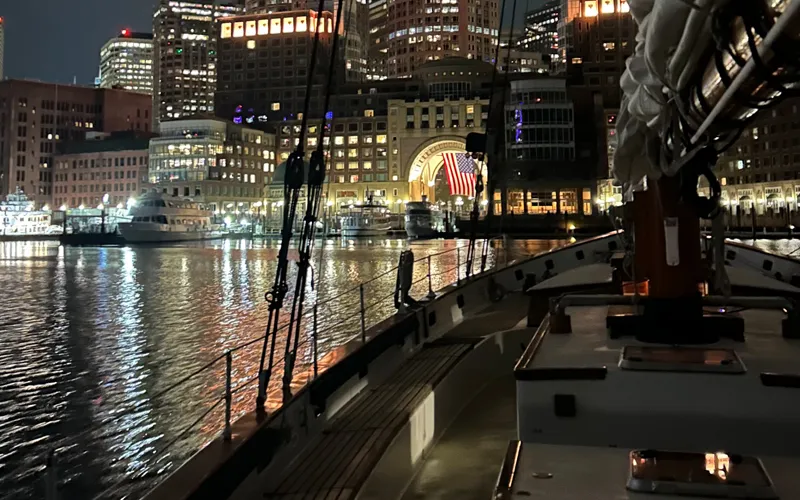 CityLigths Schooner at night with the Boston Skyline in the background