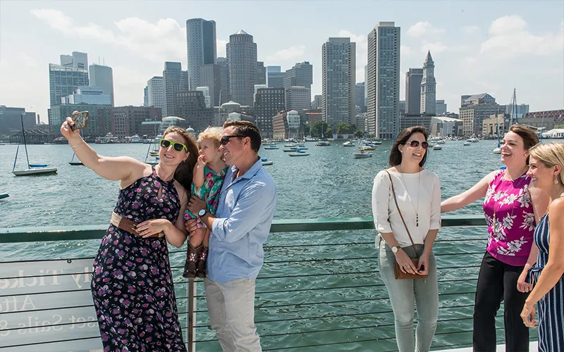 Family taking a selfie on a Boston Harbor Sightseeing Cruise on the yacht Northern Lights