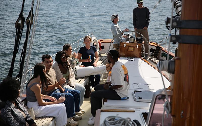 Friends on schooner Adirondack II for a day sail in Boston Harbor