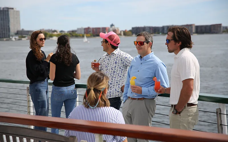 Group of friends enjoying an afternoon sightseeing cruise in Boston Harbor aboard the Yacht Northern Lights