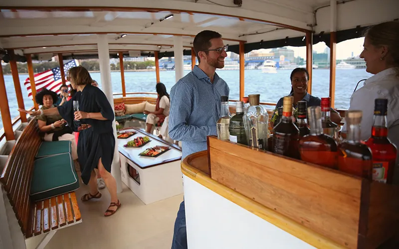 Guests in the salon of Yacht Patriot